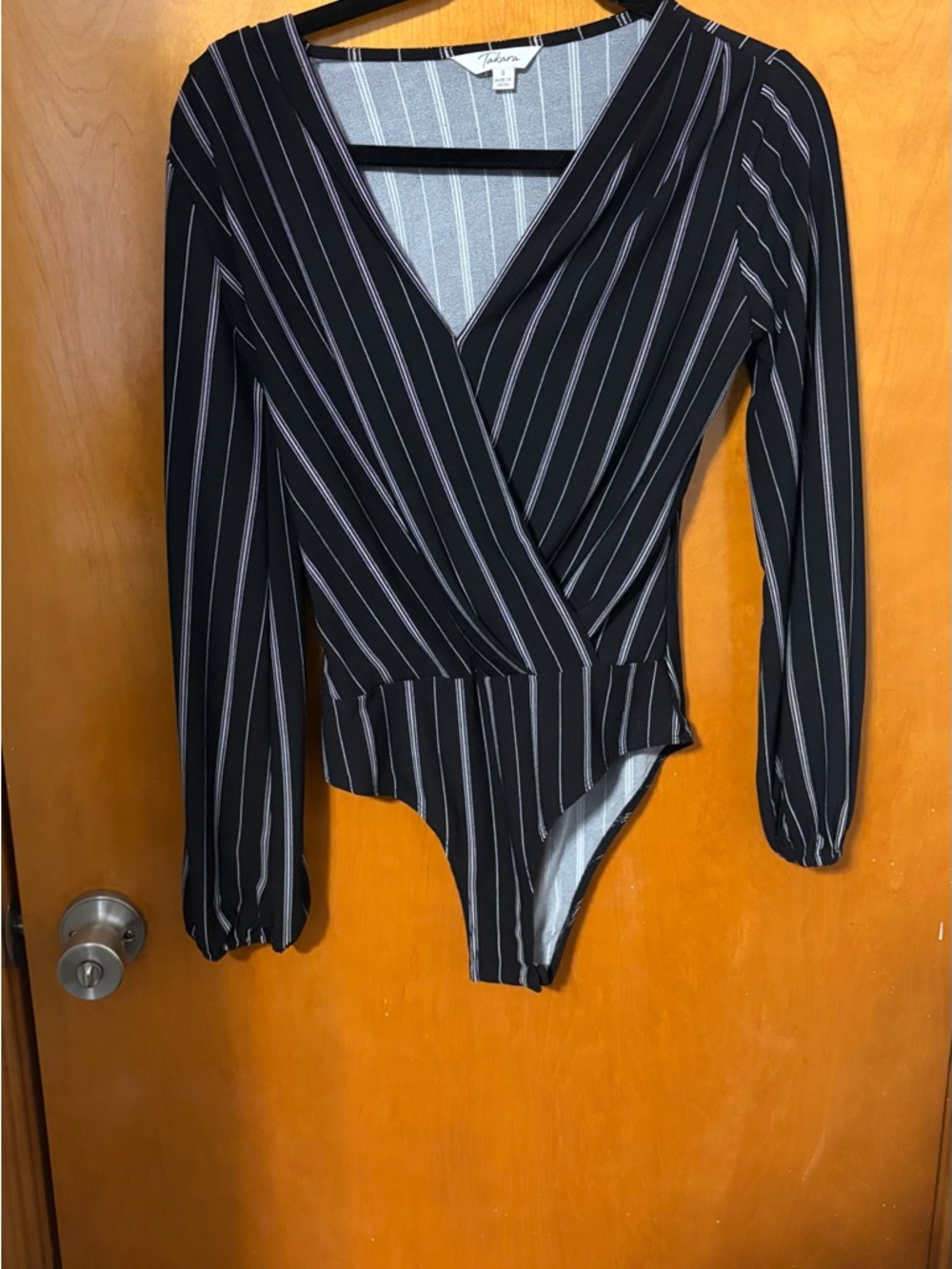 Takara Black One-Piece Bodysuit with White and Light Purple Pinstripes